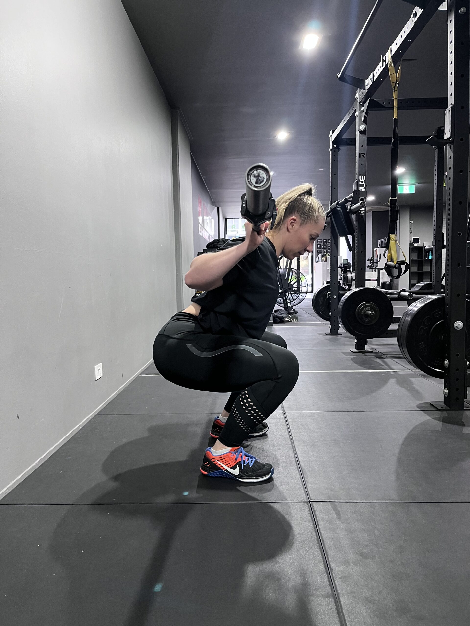 How to position the barbell for a back squat. 
